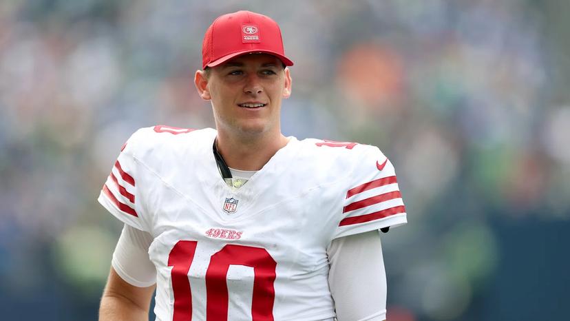 49ers Make Latest Move Regarding Mac Jones’ Future as GM John Lynch Receives More Than 3 Calls and $30 Million Trade Requests